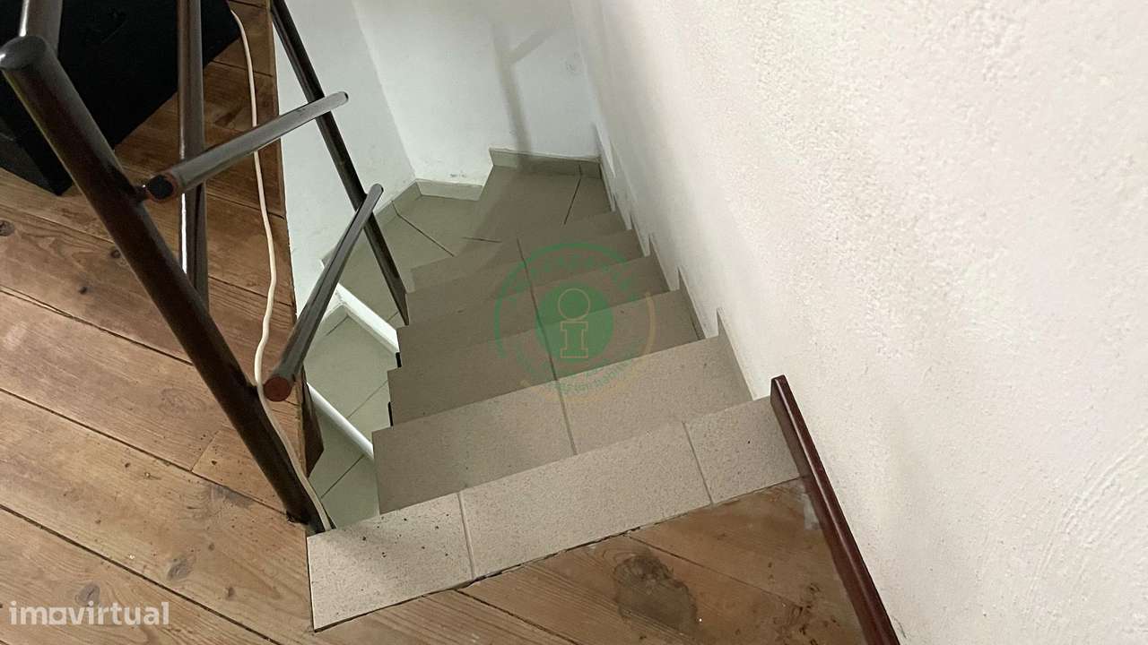 Casa com Terraço e Espaço Versátil-15