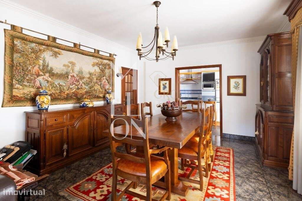 Moradia térrea com charme clássico e ambientes acolhedores - Grande imagem: 5/26