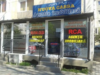 Sc Nuova Cassa Real Estate Srl Siglă