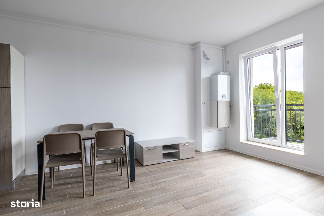 Garsoniera open space intima, etaj 8, cu balcon si priveliste in parc - Imagine principală: 5/14