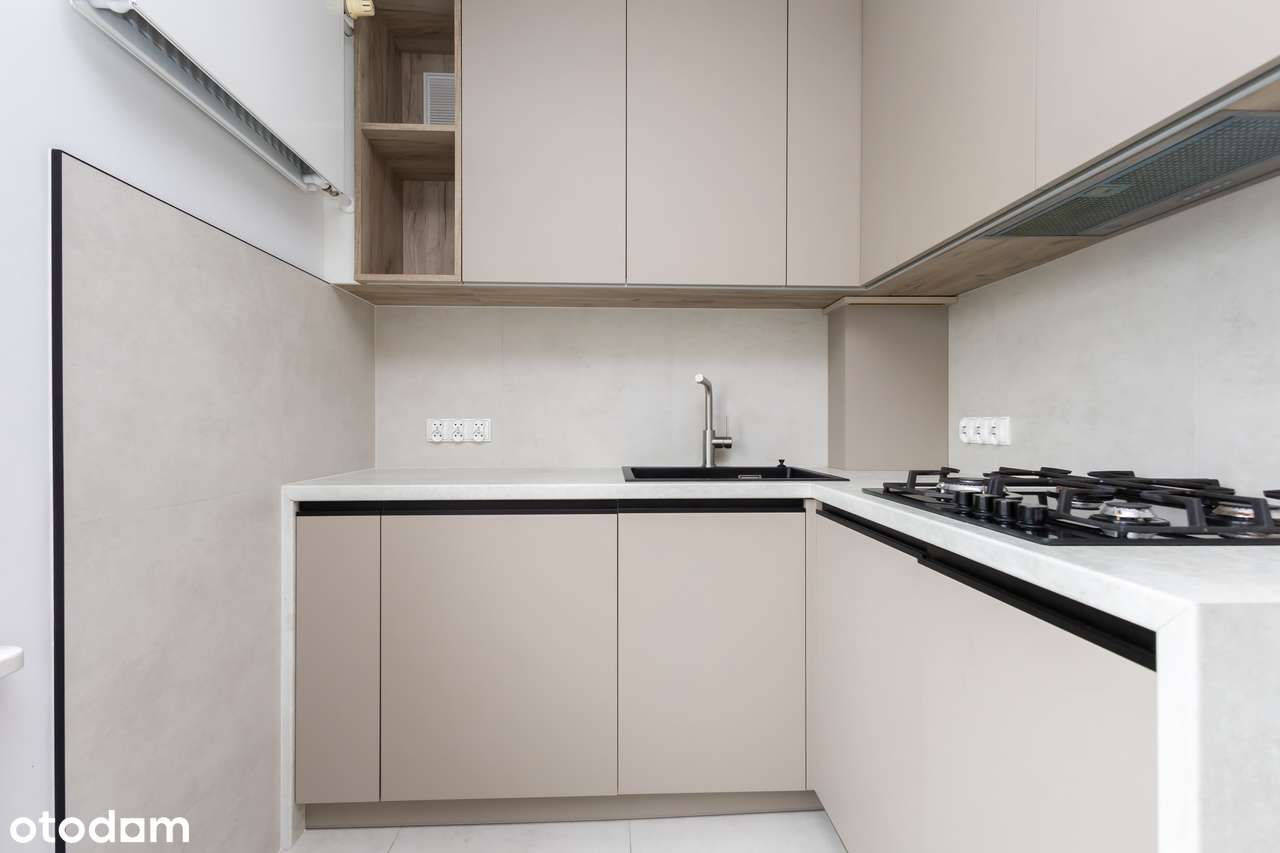 Dwa pokoje plus osobna kuchnia. Mieszkanie po generalnym remoncie.-0