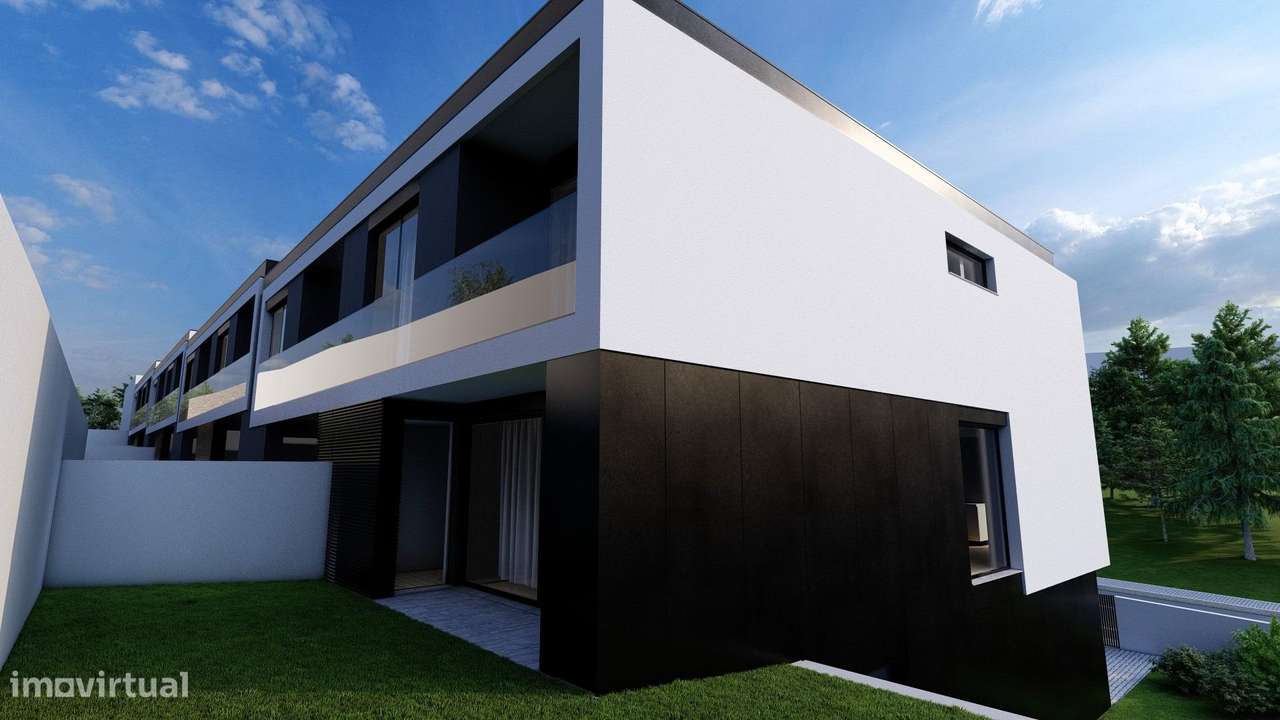 Moradia de Gaveto com dois pisos e garagem lateral-8