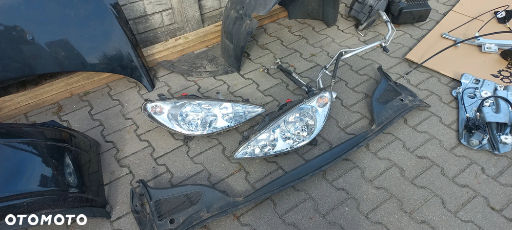 peugeot 307 cc lampa reflektor  lewy  prawy europa igła - 2