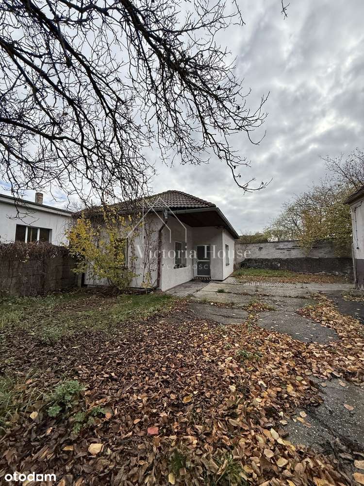 Teren usługowy z zabudowaniami.-7