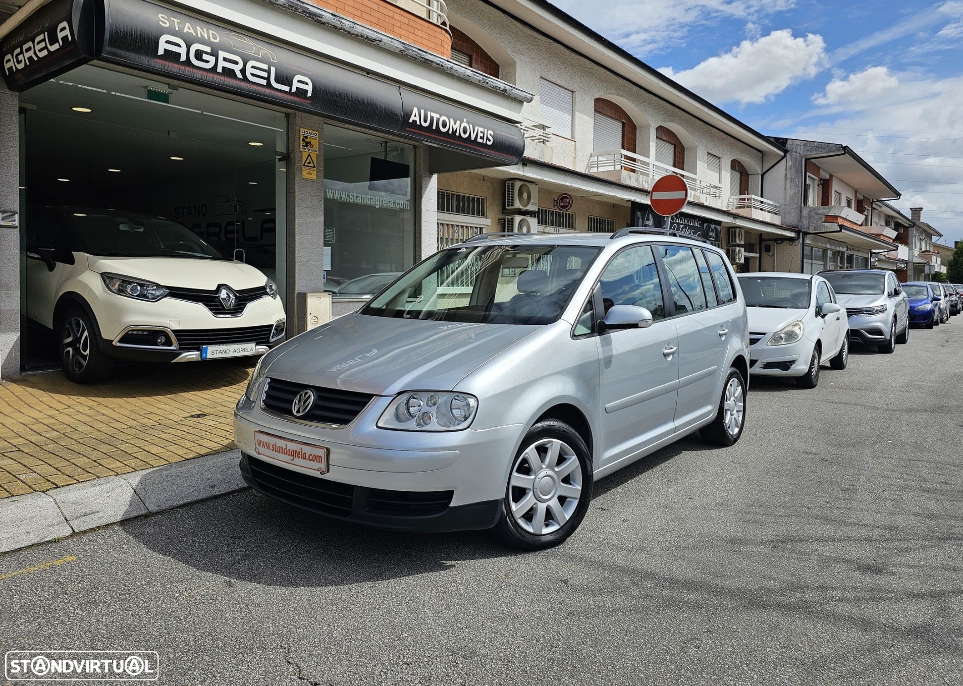 VW Touran 1.9 TDi Highline EC 7L DSG - 1