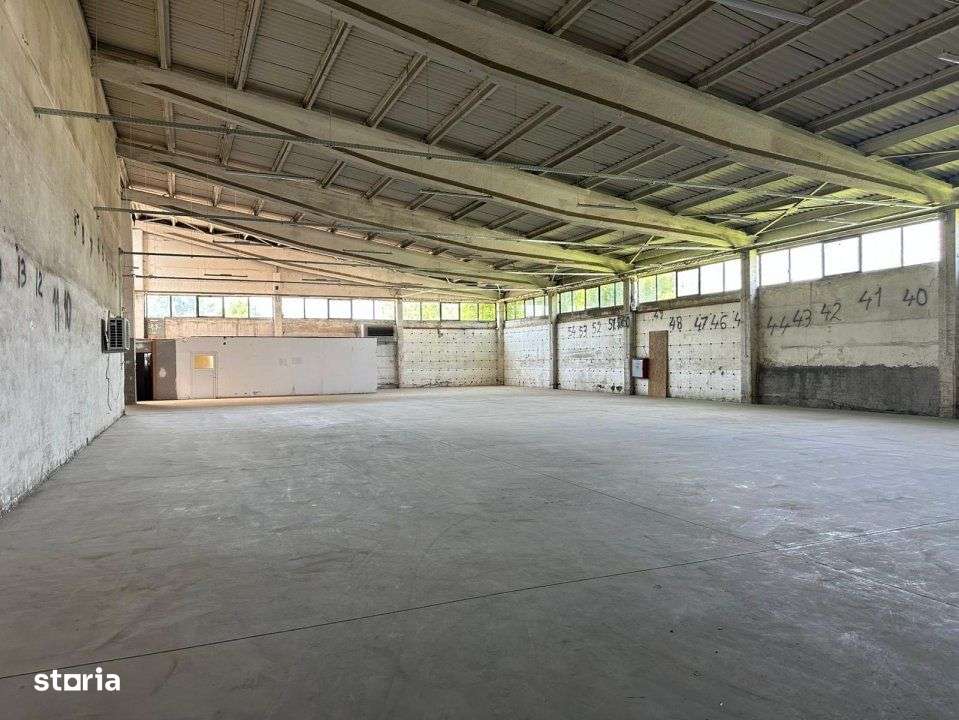 Hala industriala cu curte betonata si acces usor la ocolitoare - Imagine principală: 1/5