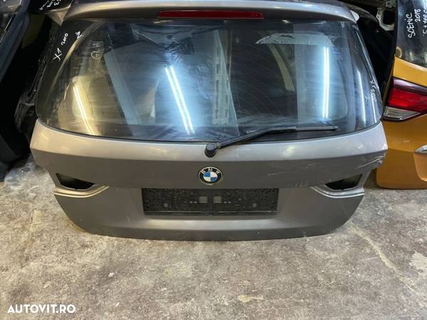 Haion BMW X1 an 2010-2015 cu luneta,ornamente,stergator - 2