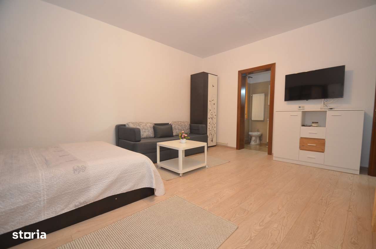Apartament spatios cu centrala proprie - Imagine principală: 2/13