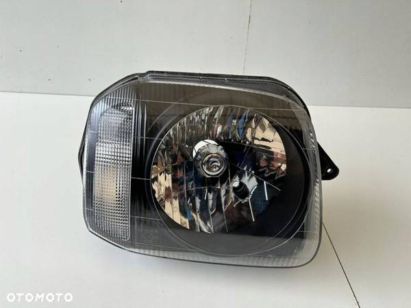 SUZUKI JIMNY LAMPA PRAWY PRZÓD KOITO 100-32081 - 1