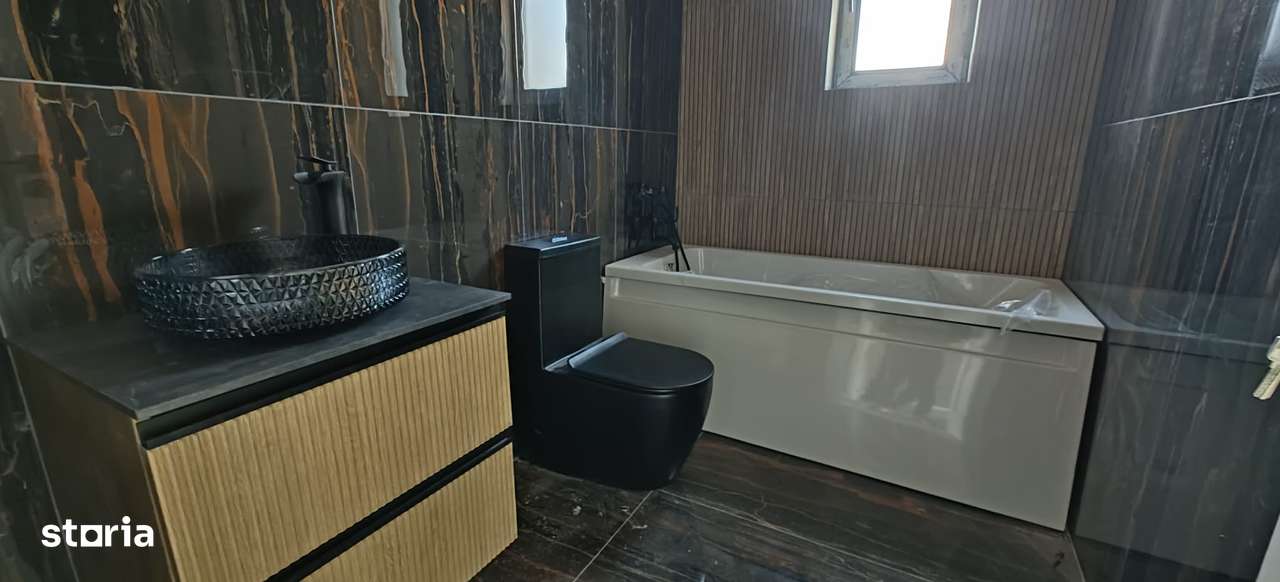 Casa individuala  -  120 mp utili  -  5 camere  -  428 mp teren - Imagine principală: 5/6