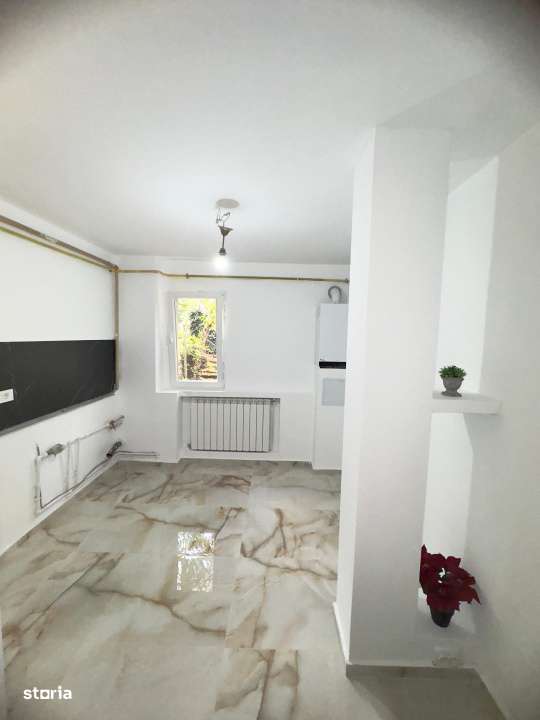 Apartament cu 2 camere, balcon si gradina privata, centrala proprie, 0-5