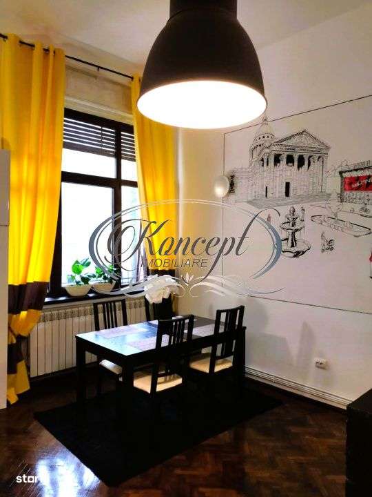 Apartament cu finisaje clasice in zona centrala - Imagine principală: 5/8
