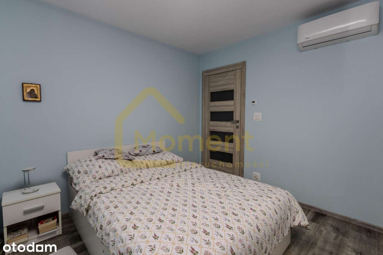 Ekonomiczny dom z garażem i pięknym ogrodem-12