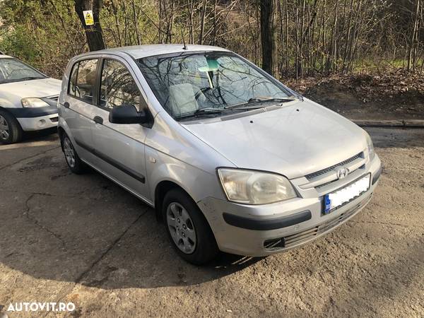 Dezmembrez Hyundai Getz gri 2005 benzina - 3