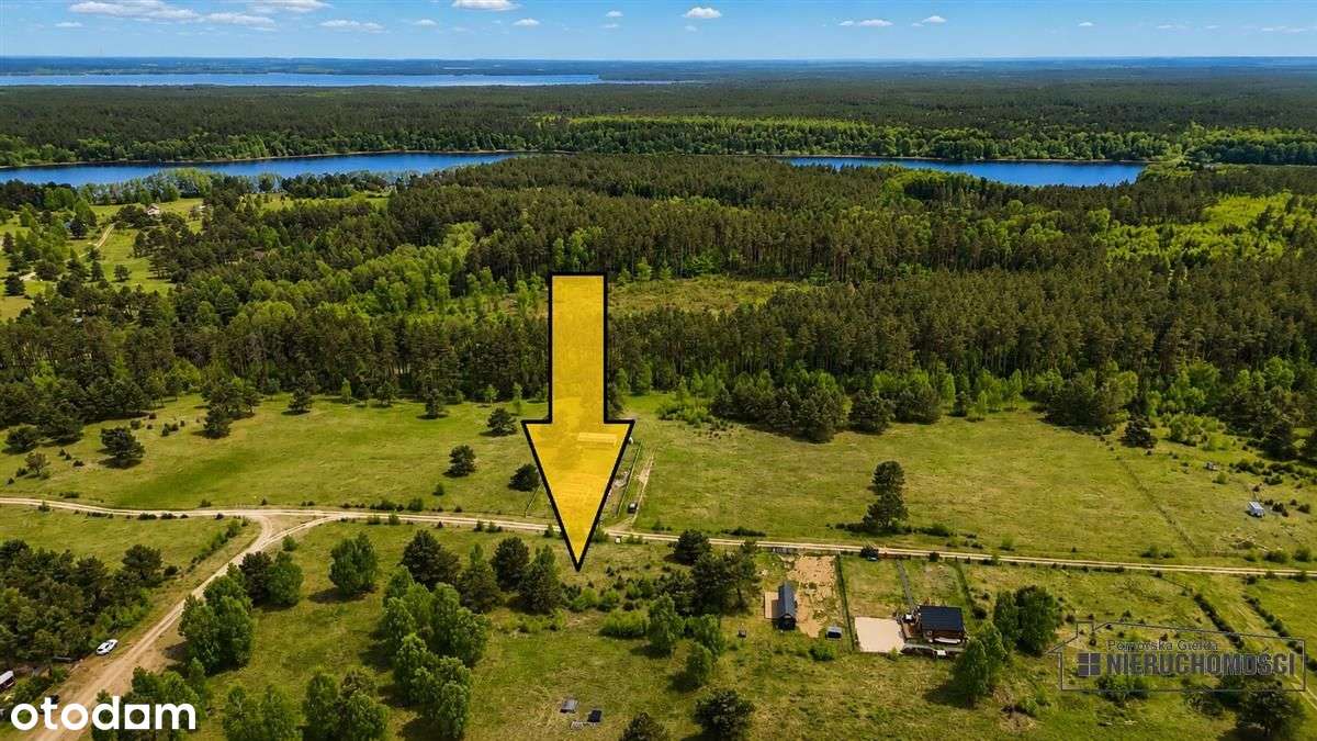 Działka budowlana nad pięknym jeziorem Dołgie.-1
