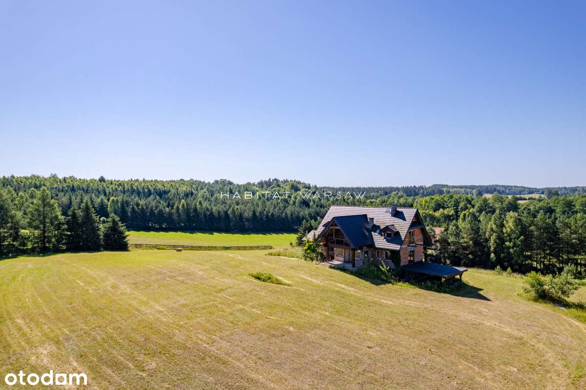 Dom z potencjałem w otoczeniu jeziora i lasu-19