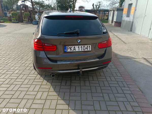 BMW Seria 3 318d DPF Touring Edition Lifestyle - 24