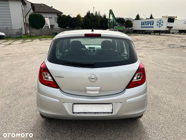 Opel Corsa 1.2 16V Enjoy - 23