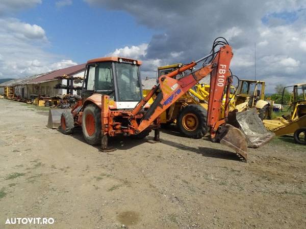 Dezmembrez buldoexcavator New Holland - 7