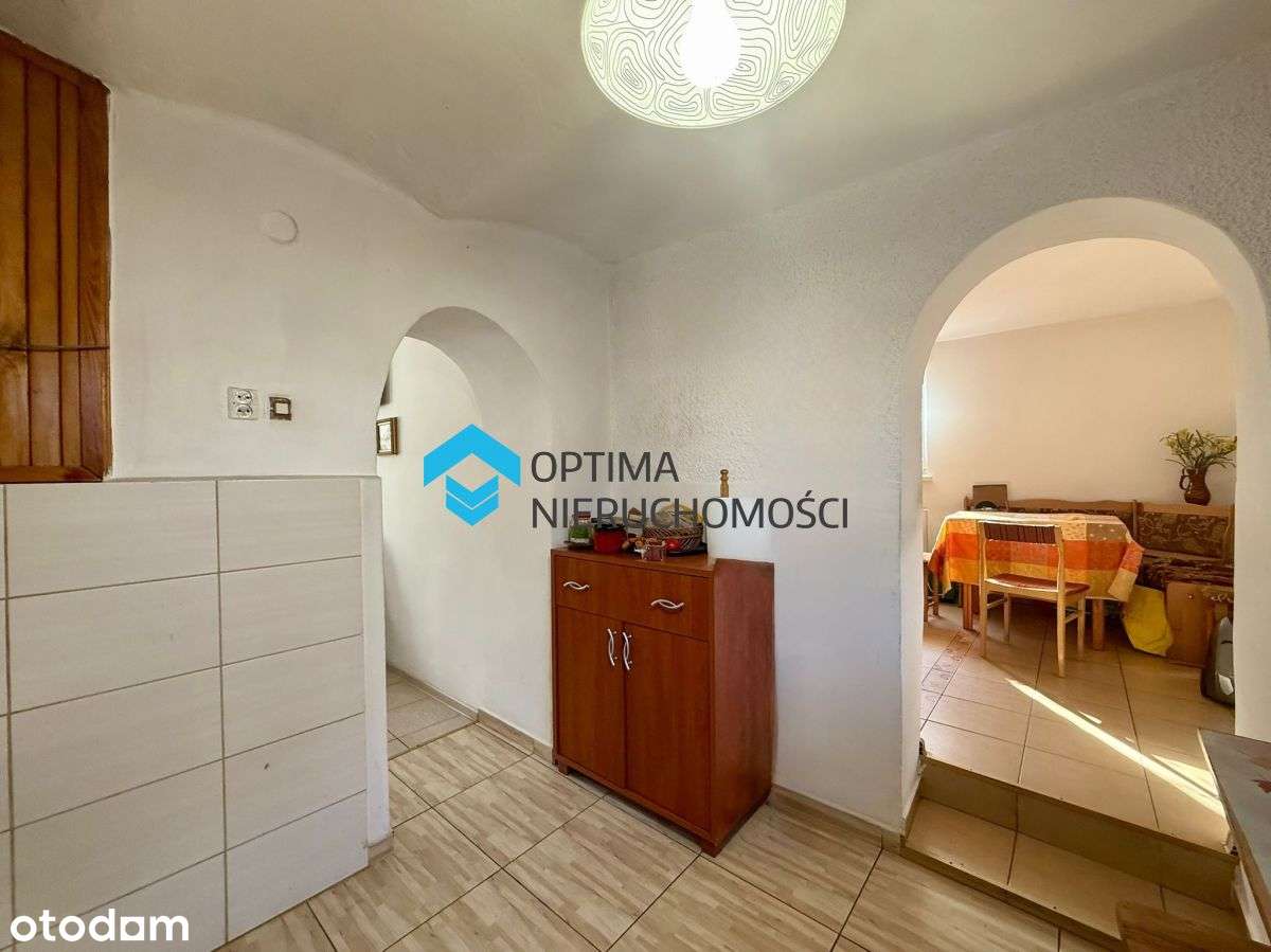 Dom z potencjałem w spokojnej dzielnicy-6