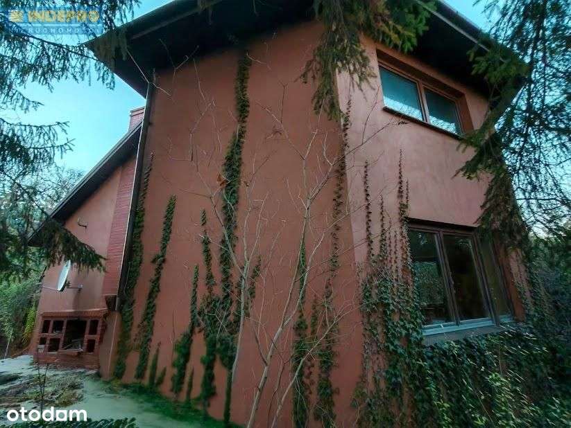 Zielona enklawa w mieście – dom z potencjałem!-0