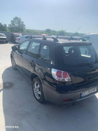 Dezmembrez Mitsubishi Outlander 2.4 cod motor 4g69 benzina - 1