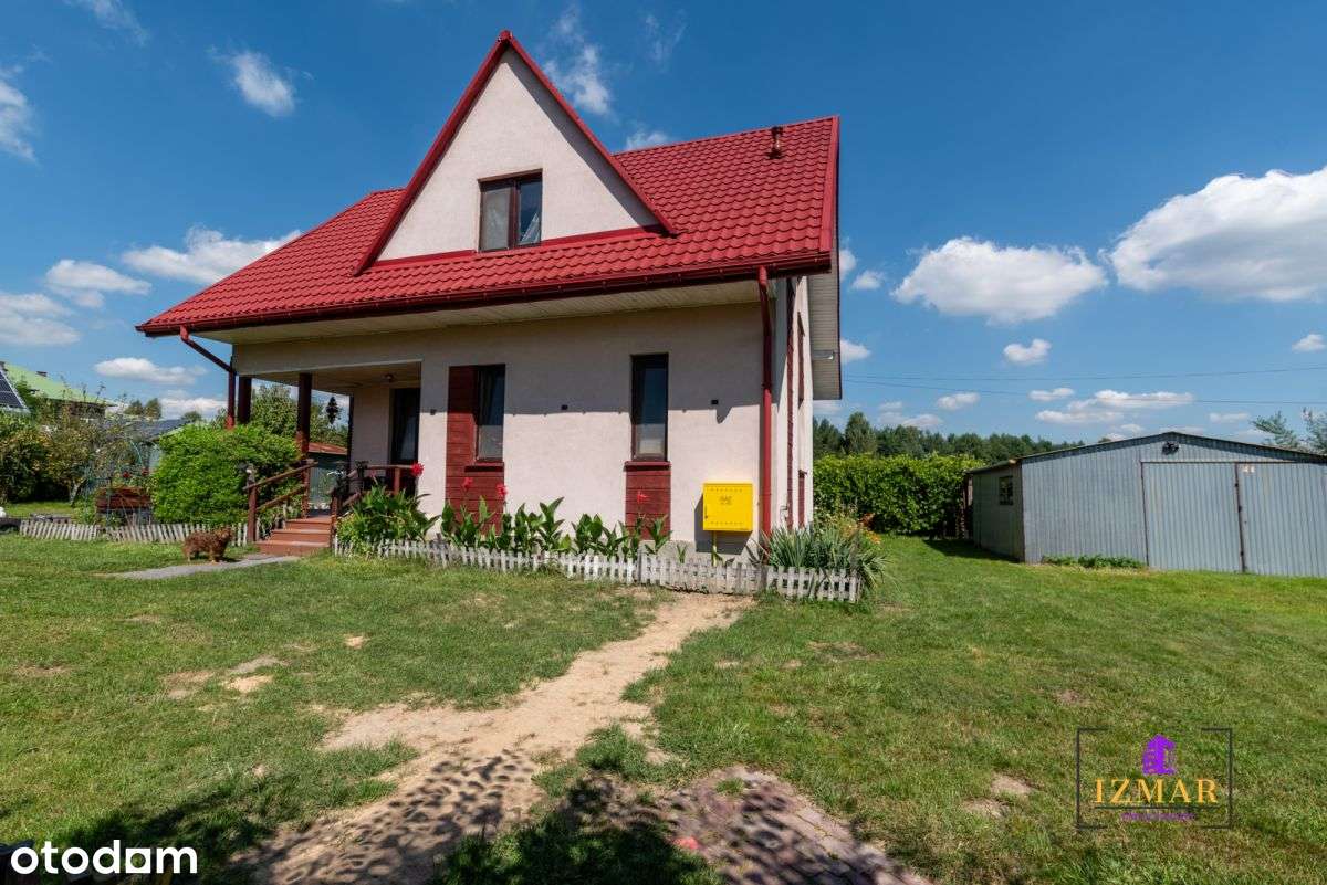 Funkcjonalny dom z 2 garażami i ogrodem-13