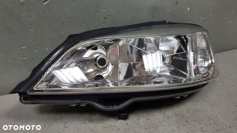 Lampa Lewy Przód TYC Opel Astra G II - 2