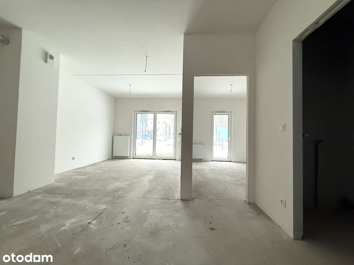 Parterowe mieszkanie 2pokojowe z ogródkiem i miejscem w hali garażowej-1