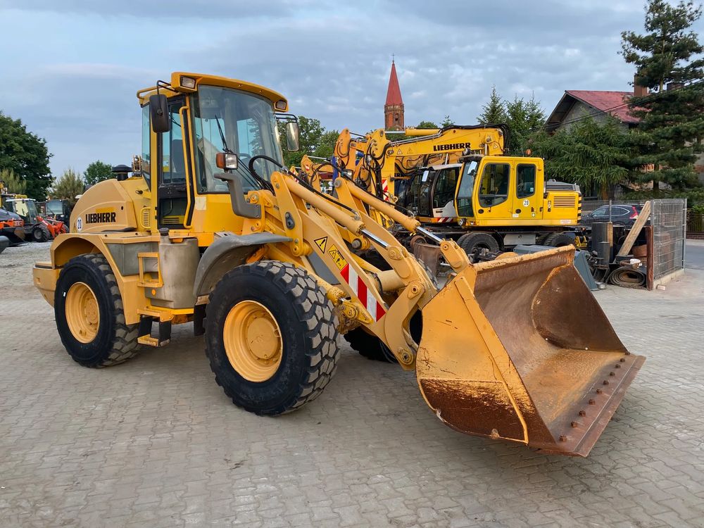 Liebherr L524, łyżka + widły, szybkozłącze, z niemiec, wzorowo utrzymana 2005