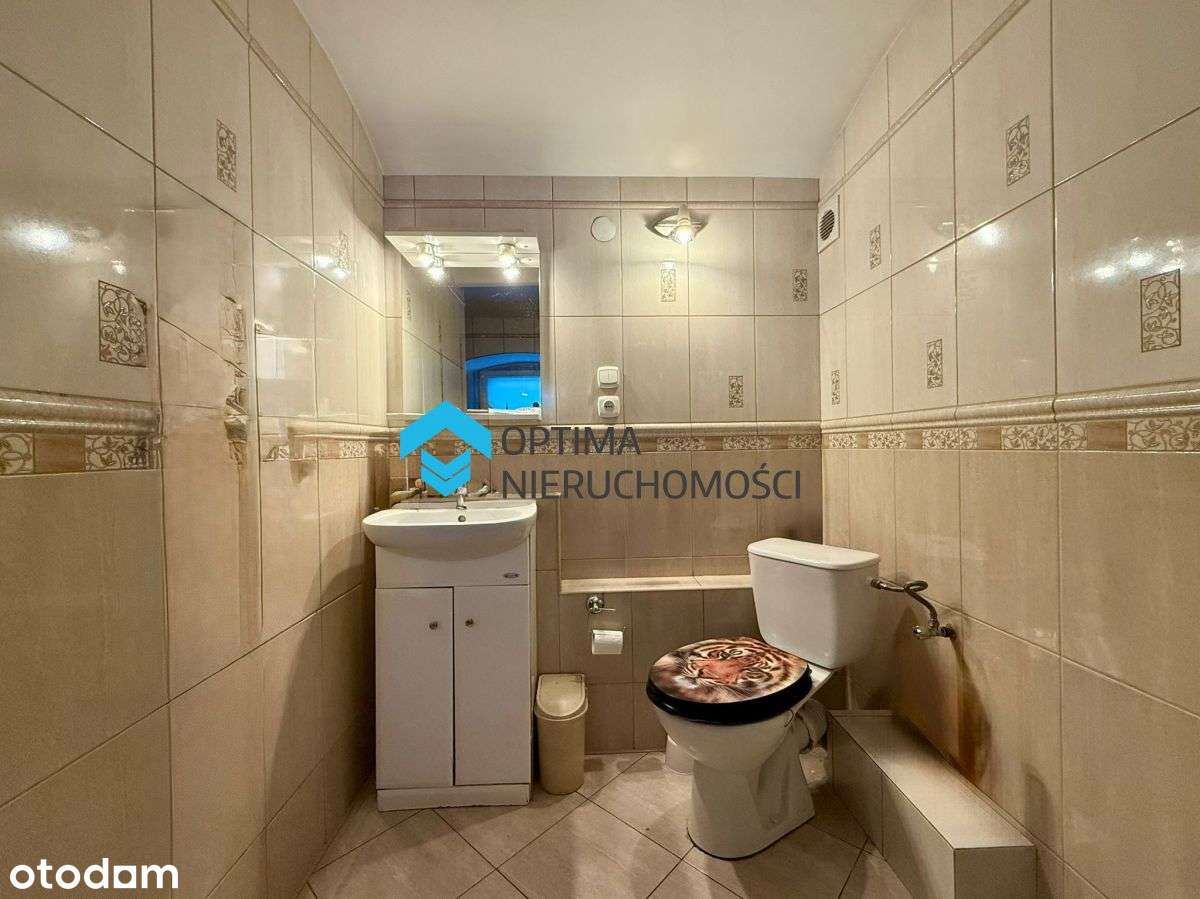 Dom z potencjałem w spokojnej dzielnicy-8