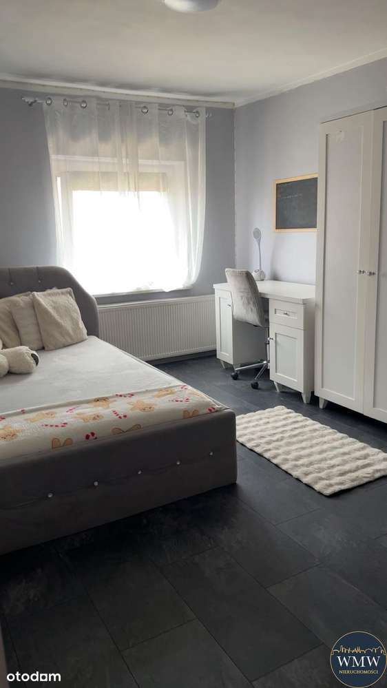 Komfortowe mieszkanie z tarasem, ogrodem i garażem – centrum Żagania-7