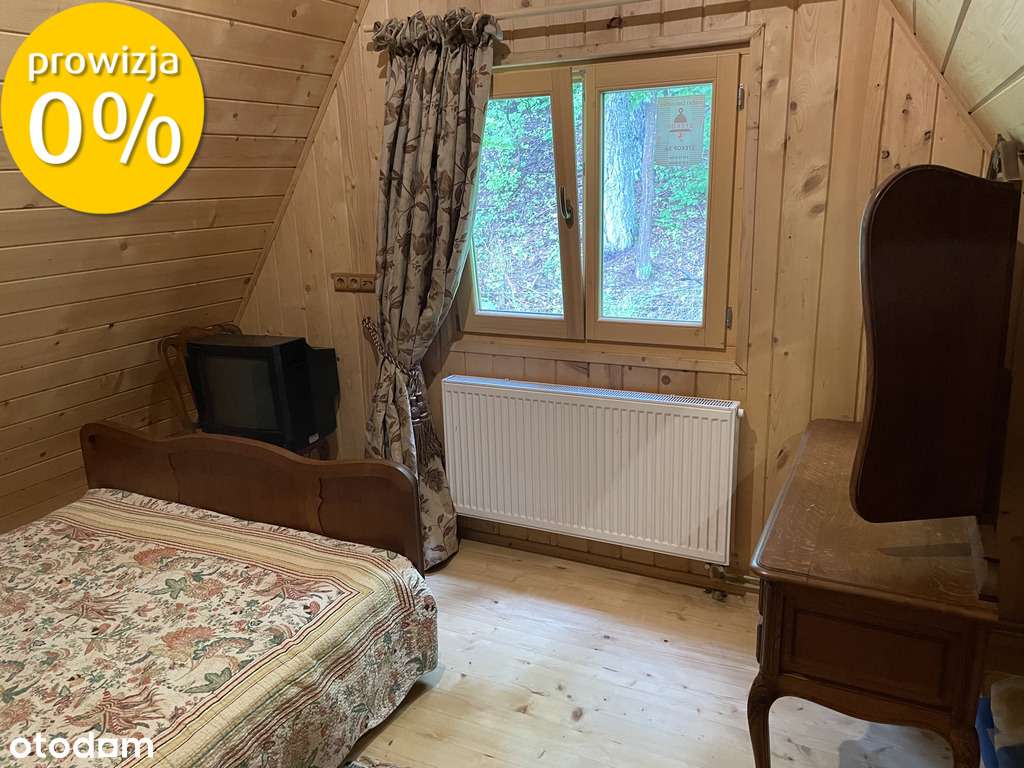 Podwójny dom z bala w enklawie ciszy i zieleni.-6