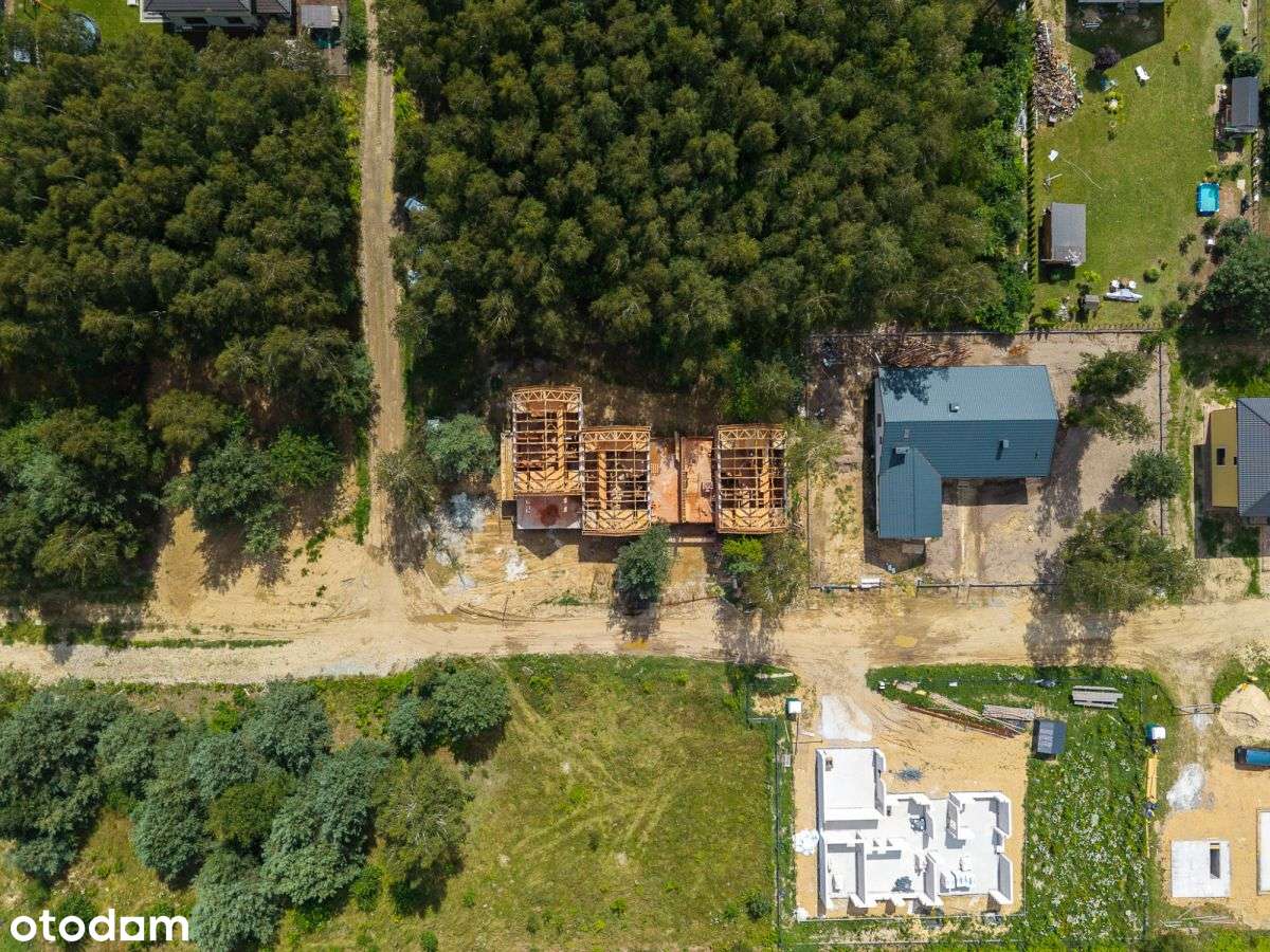 Dom z ogrodem pod Warszawą – nowoczesna inwestycja-12