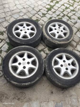 Conjunto jantes 14 mitsubishi carisma ano 2001 - 1