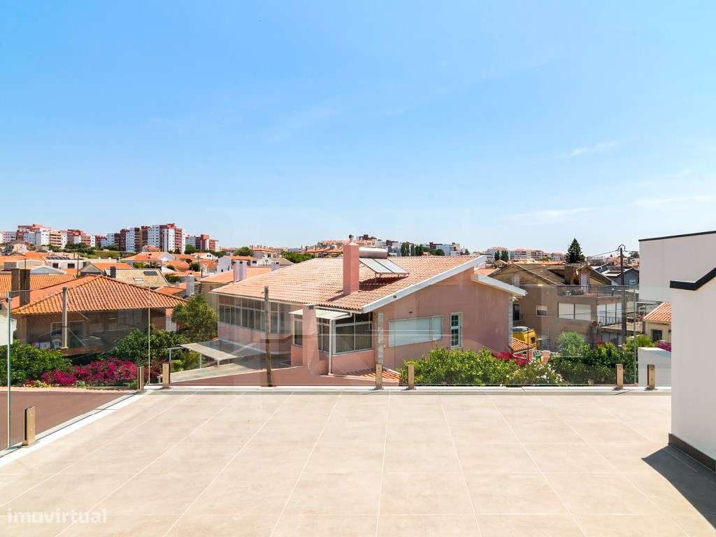 Moradia de luxo T4 no Murtal com piscina aquecida e rooftop panorâmico-23