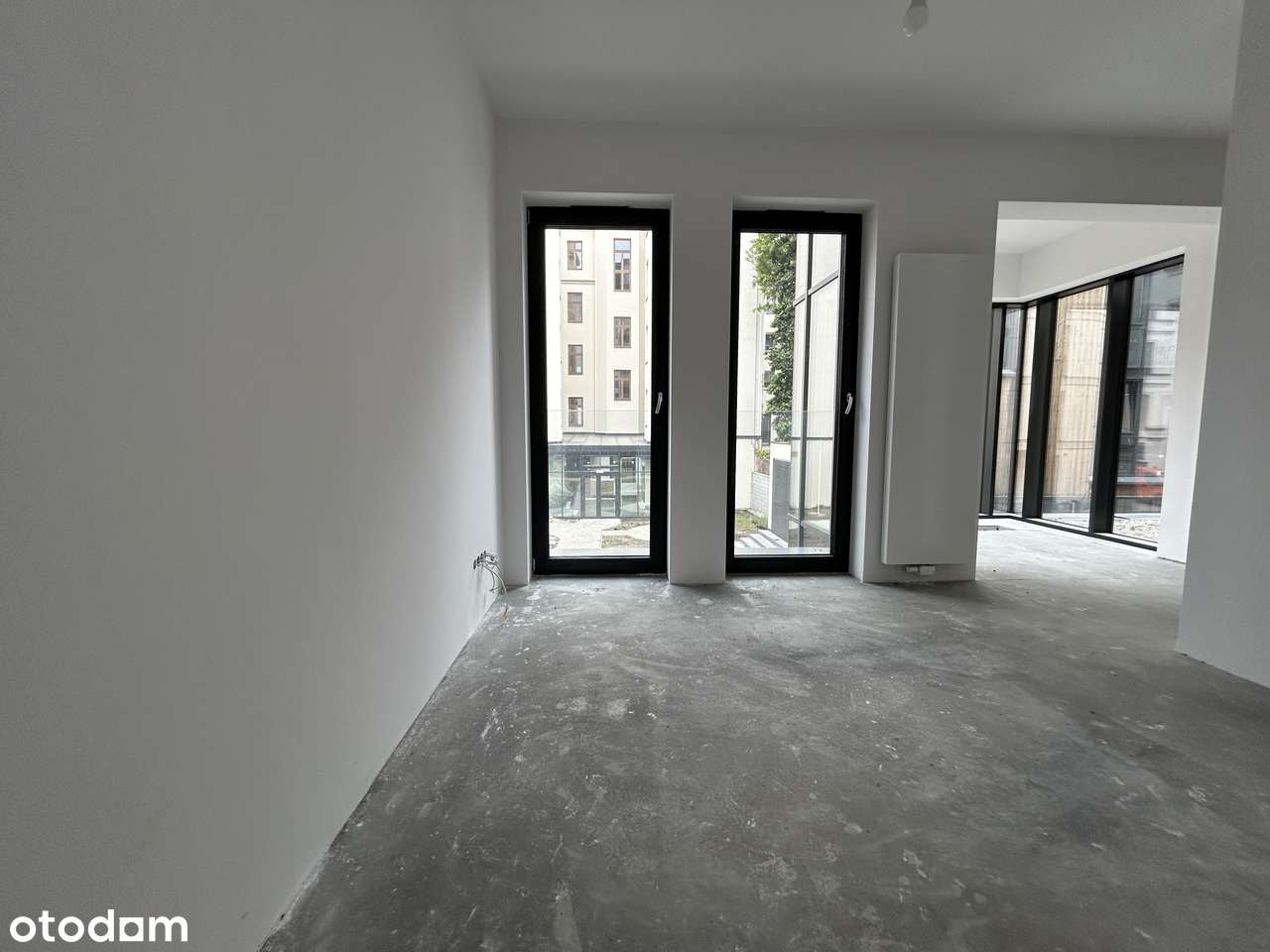 Przestronny apartament  w Centrum w stanie deweloperskim z garażem - Pełny obrazek: 3/13