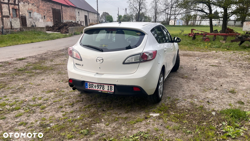 Mazda 3 2.0 Exclusive + - 12