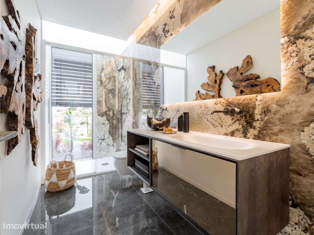 Moradia de extraordinária qualidade junto à lagoa, golfe e praia-32