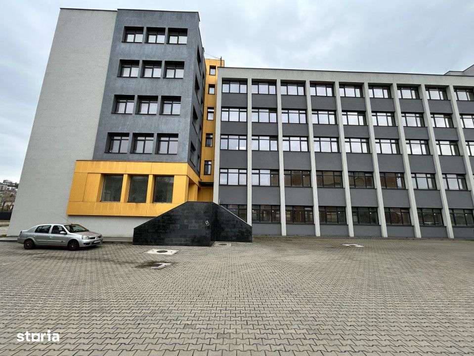 Cladire de vanzare D+P+4 cu 4670mp utili si curte 3650mp la 1280euro/m - Imagine principală: 2/16