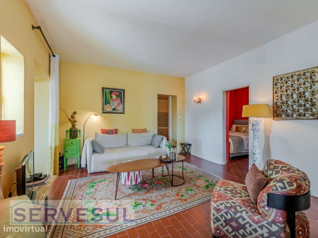 Charmosa moradia de 2 quartos de 121 m², inserida num terreno com 2...-11