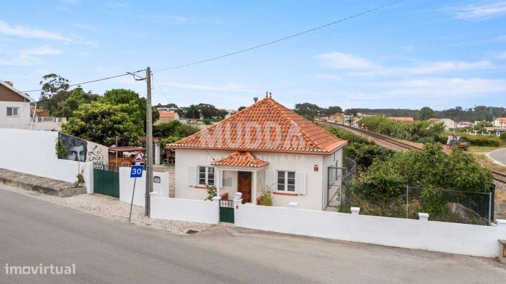 Moradia térrea T3 com anexos e terreno no Campo/Caldas da Rainha-1