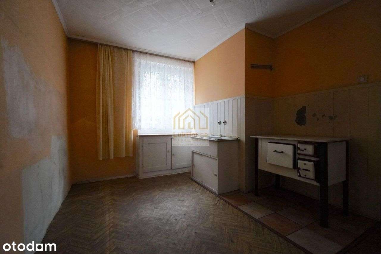 Na Sprzedaż 2-Pokojowe Mieszkanie - Parter-1