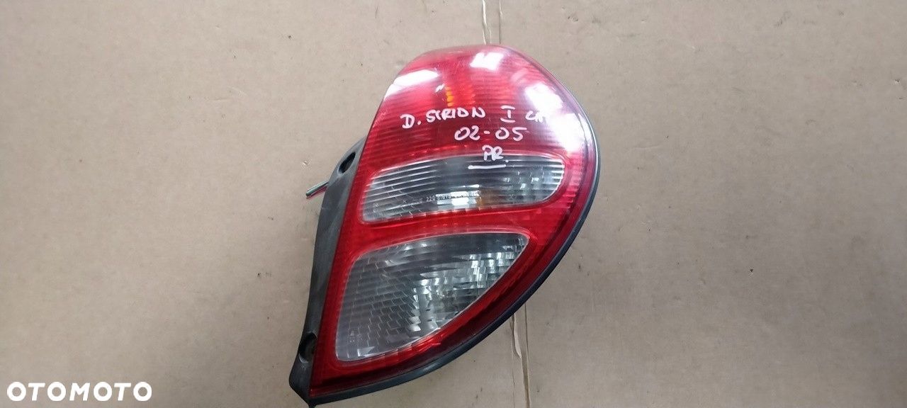 Daihatsu Sirion I lift 01- lampa tylna prawa - 1