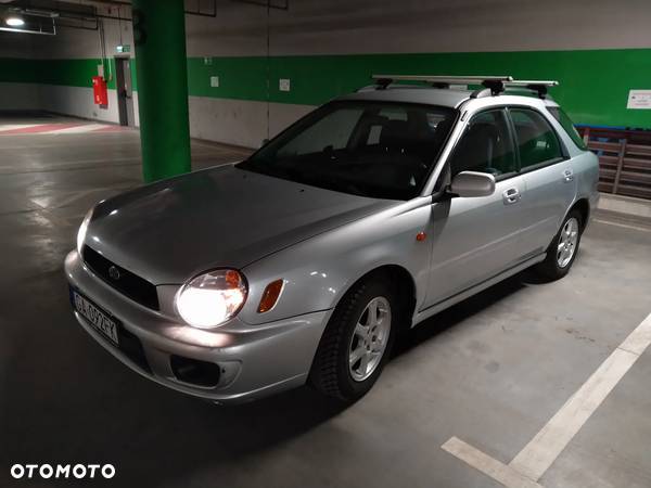 Subaru Impreza 1.6i 4x4 - 1