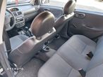 Opel Corsa 1.2 16V Comfort - 24