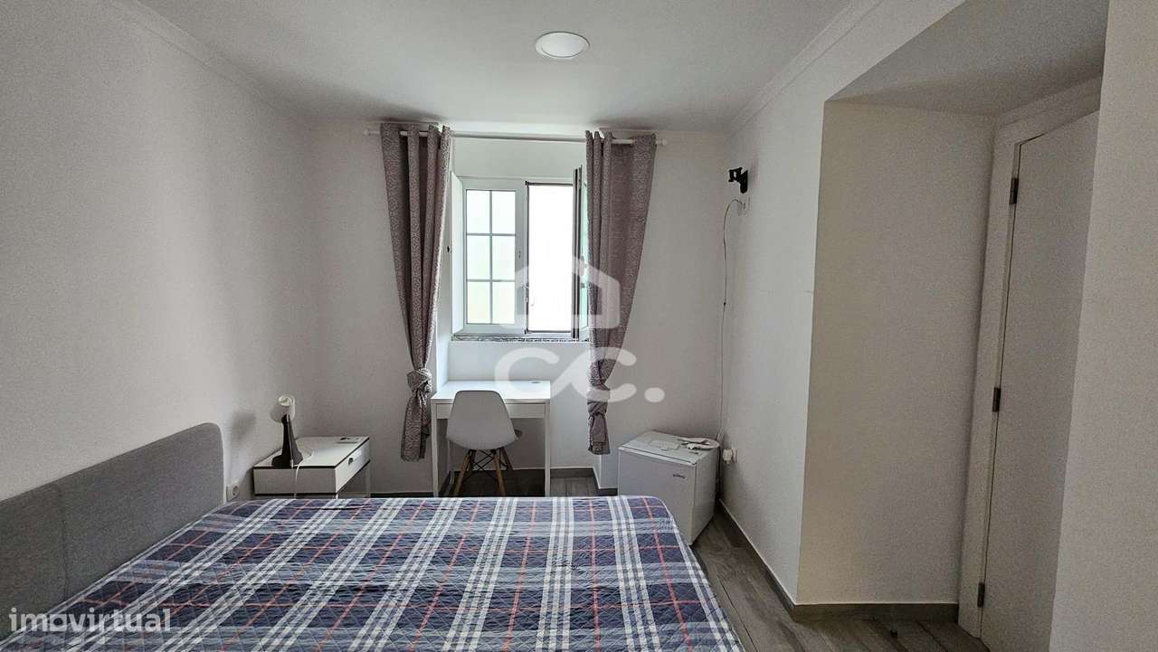 Alojamento com 10 quartos, pronto a rentabilizar, com obras recentes e-6