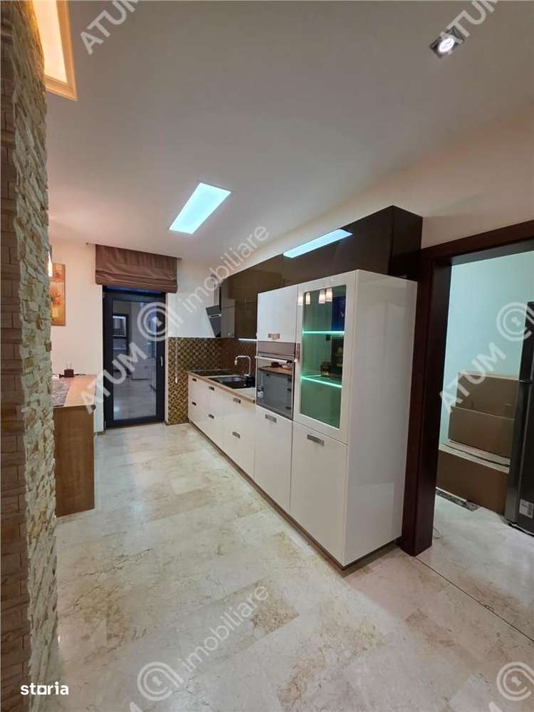 Casa 4 camere 3 bai terasa si teren 250 mp zona Octavian Goga Selimbar-17