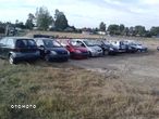 Toyota Yaris II mcperson prawy 1,0 1,3 zwrotnica - 9