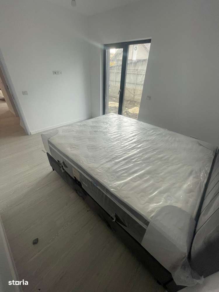 Apartament 2 camere cu curte proprie și 2 locuri de parcare-1